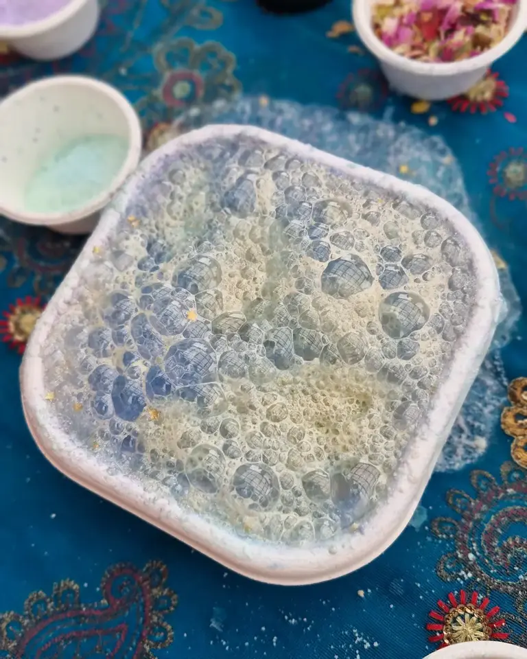 Blue and gold fizzy potion bubbling with ocean-inspired shimmer from the Secrets of the Sea Magic Potion Kit for Two by Sparkle & Spell Co.