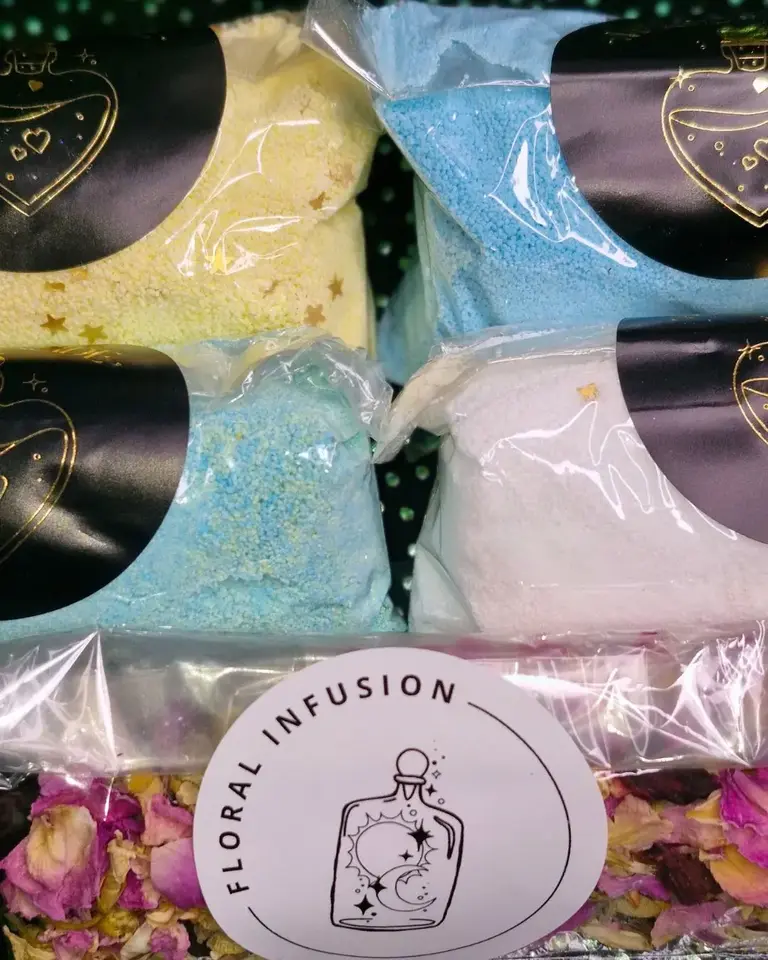 Colourful blue, yellow, and white potion powders from the Sorcerer’s Spellbook Magic Potion Kit by Sparkle & Spell Co., handmade in New Zealand using food-grade ingredients.